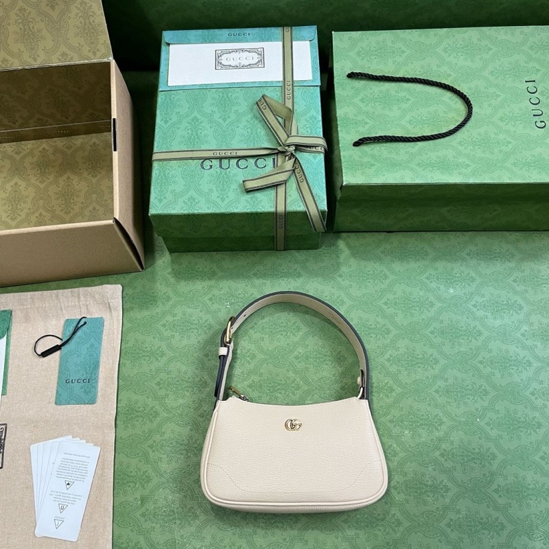 G*u*i top handle bags